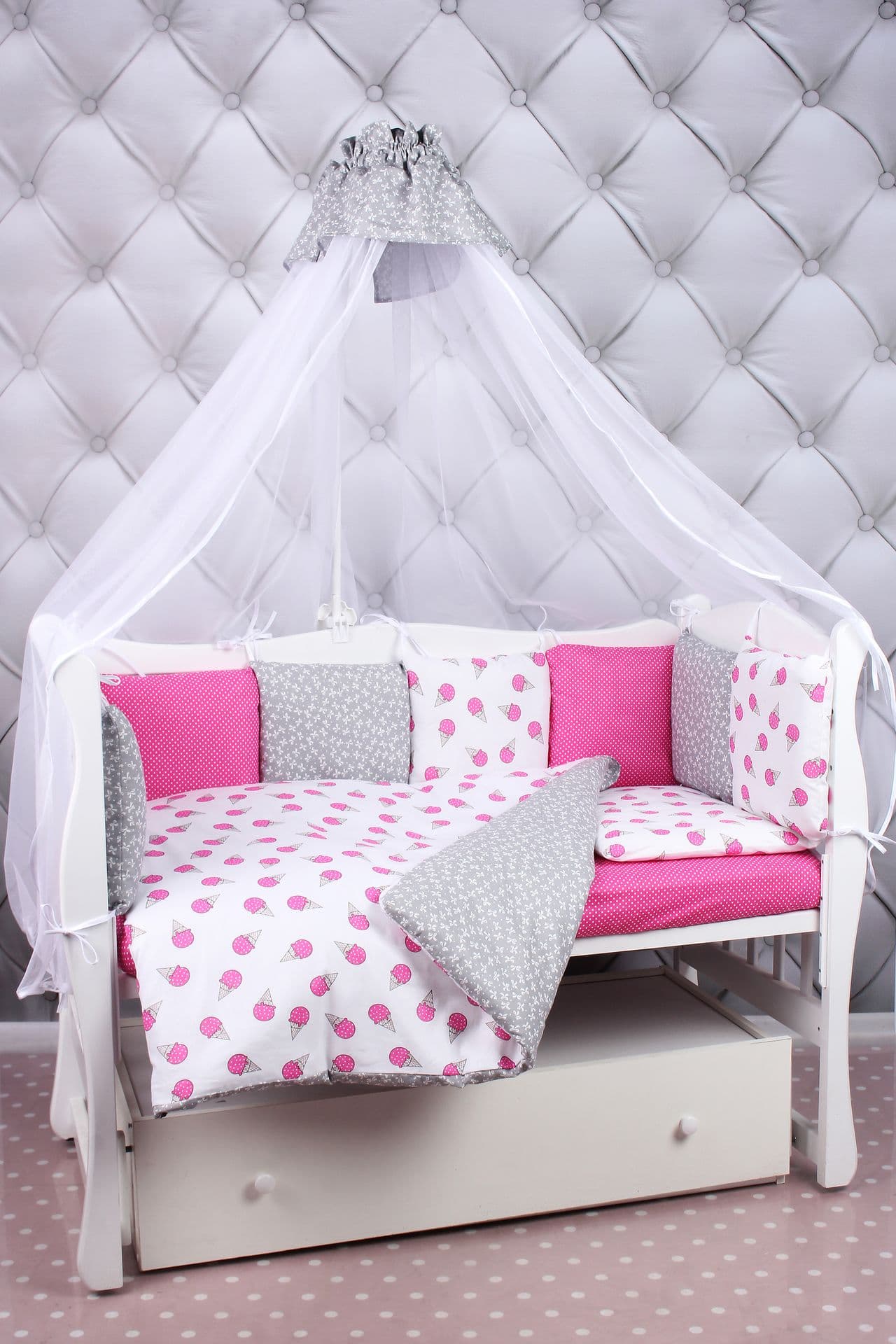 Комплект в кроватку розовый