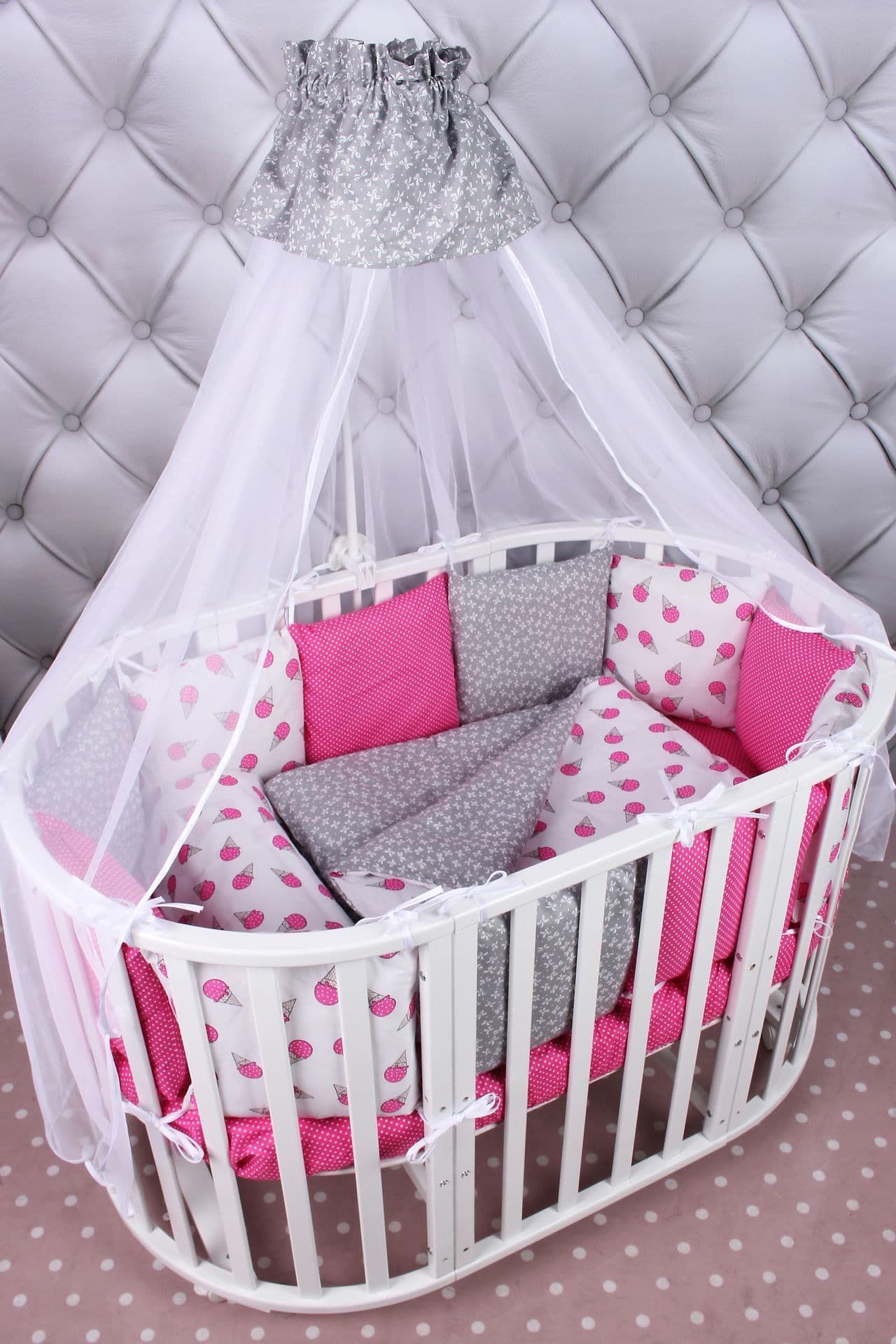 Комплект в кроватку розовый